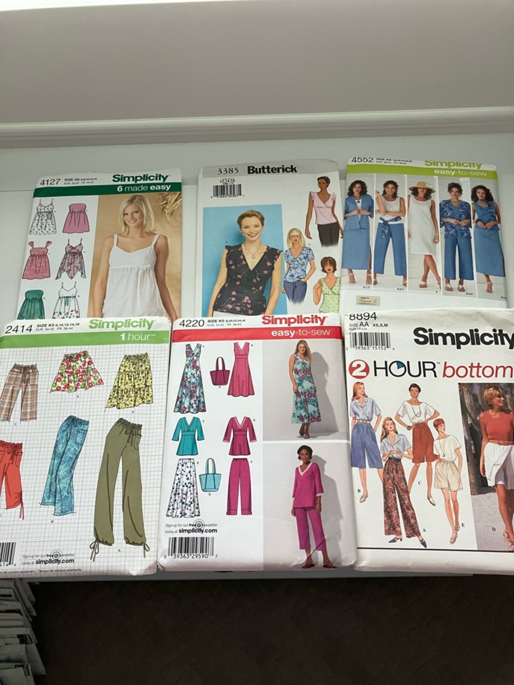Six uncut women’s sewing patterns separates size is 8–16